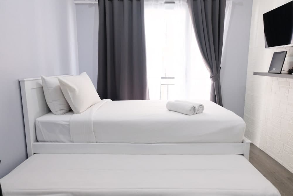 Comfy Studio Apartment At Grand Asia Afrika