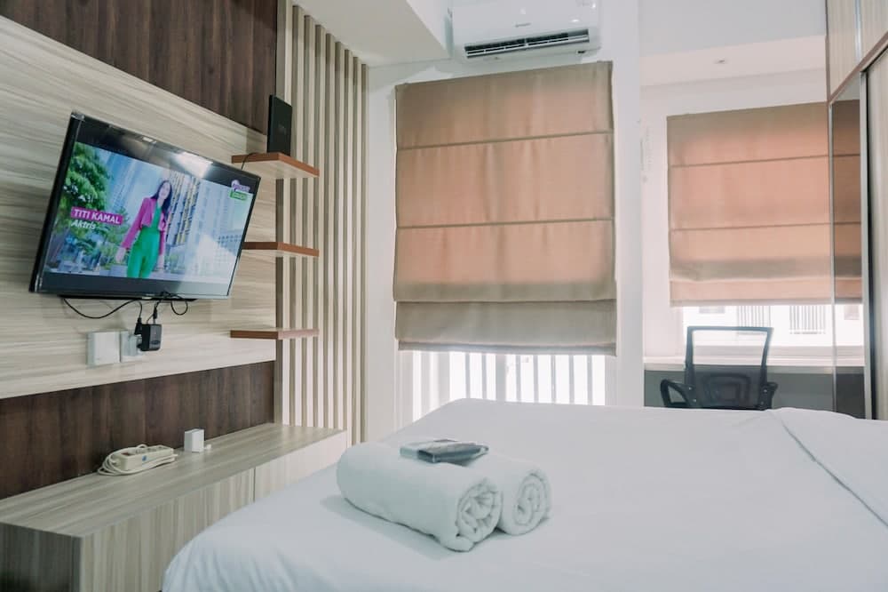 Homey And Relaxing Studio Serpong Garden Apartment