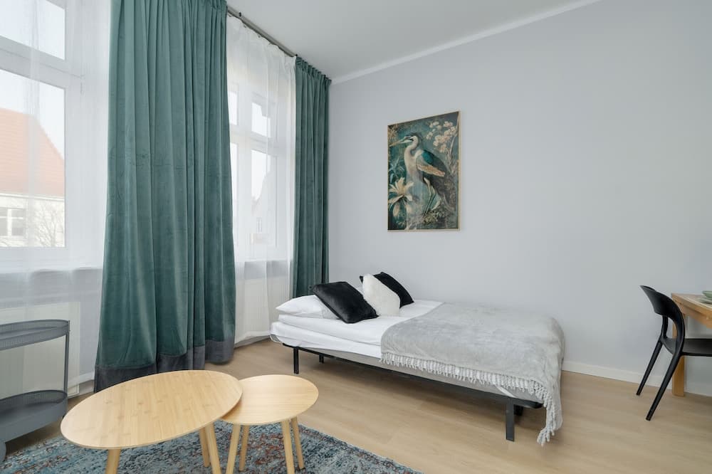 Stylish Grey Studio in Poznan by Renters