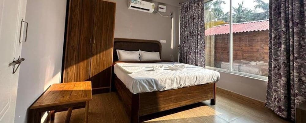 Fabhotel Morjim Cottages