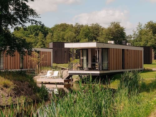 Modern Lodge on the Water in a Holiday Park