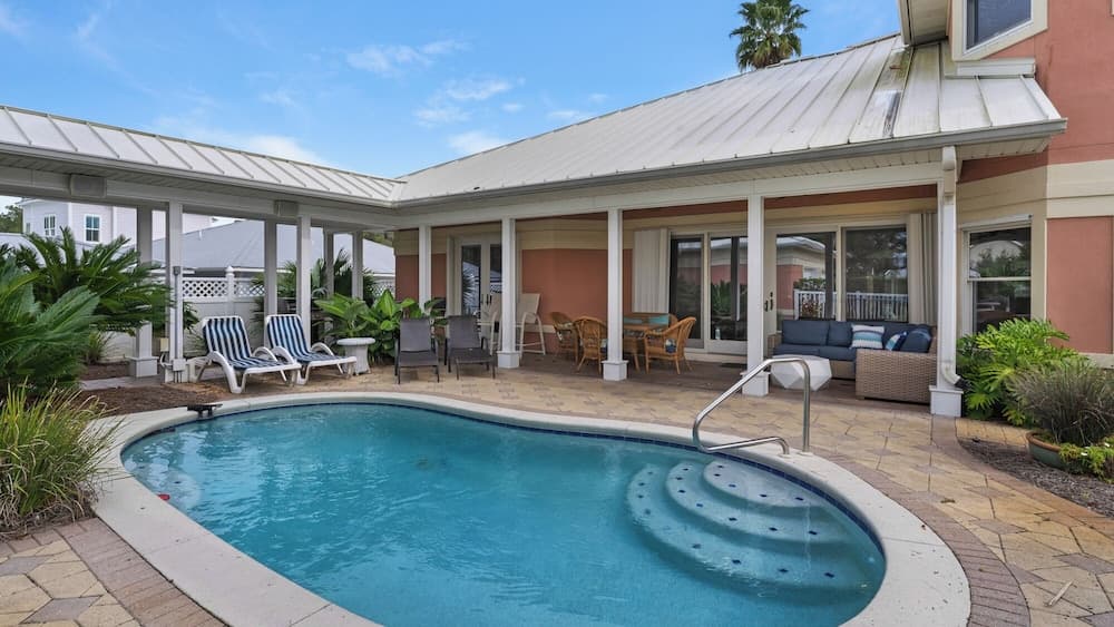 Spacious Retreat w/ Heated Pool, Sunset Deck & Golf Cart. Quick Walk to Beach
