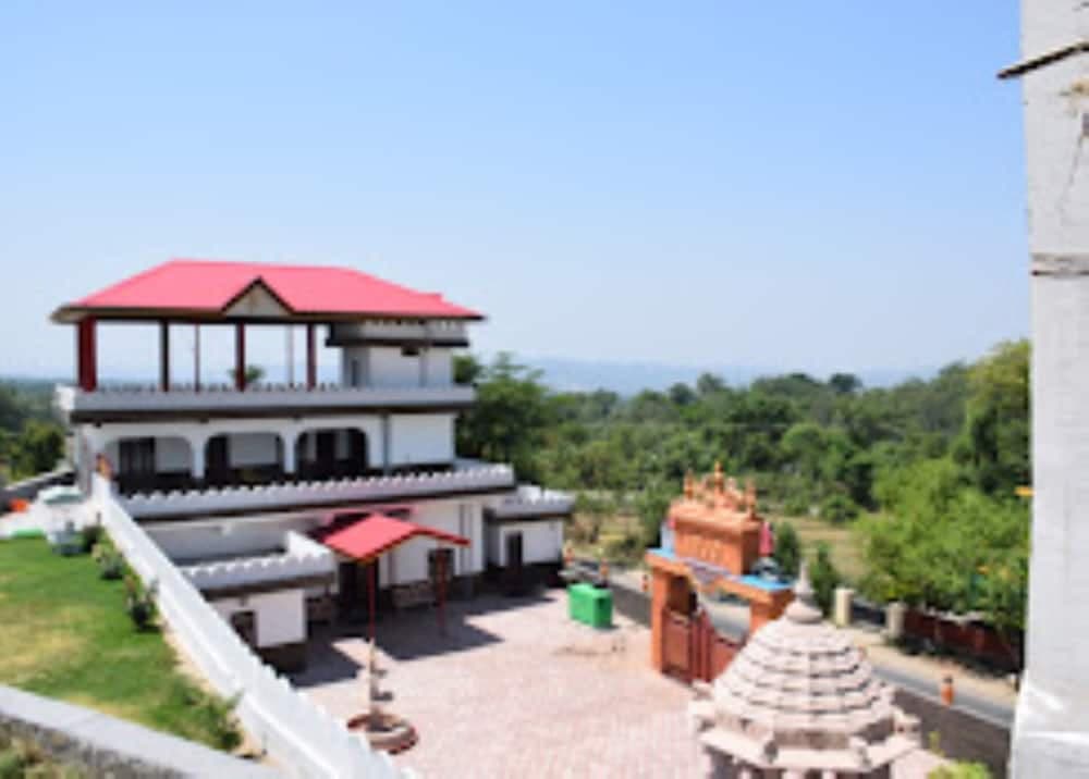 Goroomgo Hotel Aqua Waterfall Dharamsala