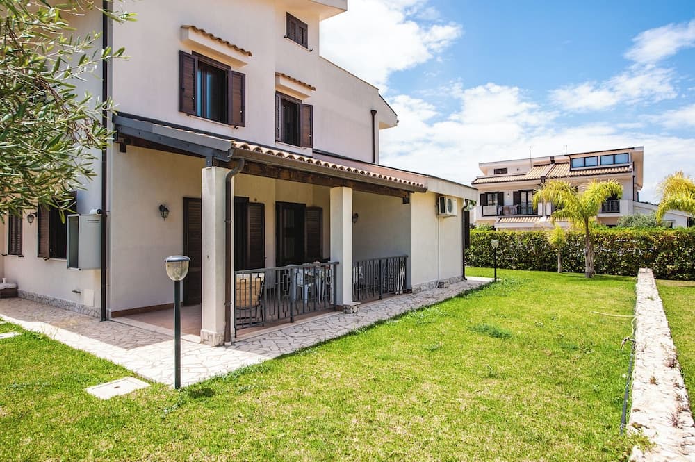 Casa Isola con Giardino