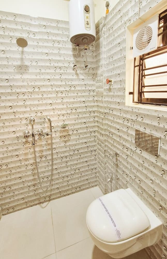 Elle tutulan duş başlığı