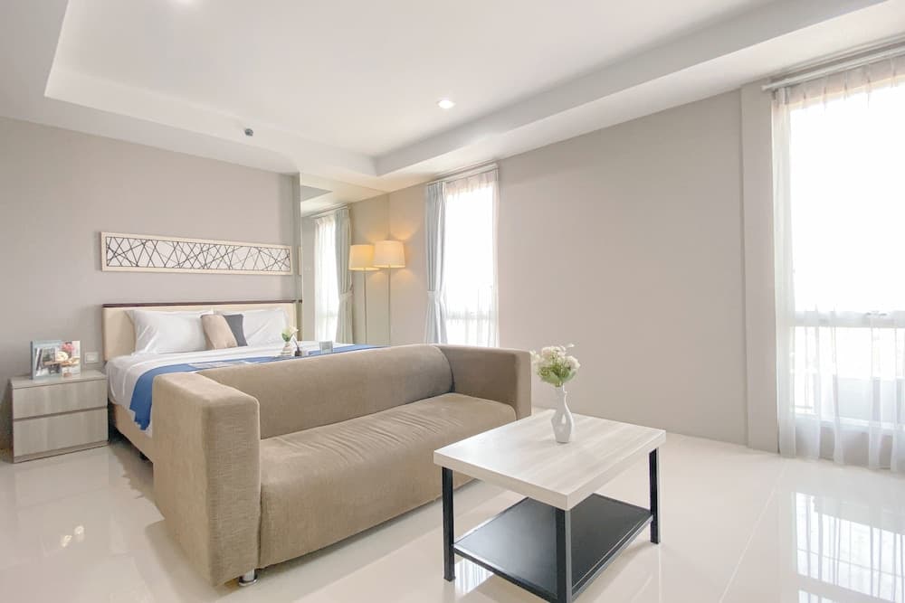 Spacious And Cozy Living Studio At Azalea Suites Apartment