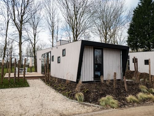 Modern Chalet by the River Maas
