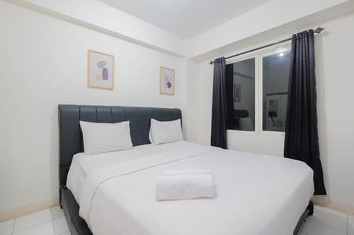 Comfort and Homey 2BR at Podomoro Golf View Apartment