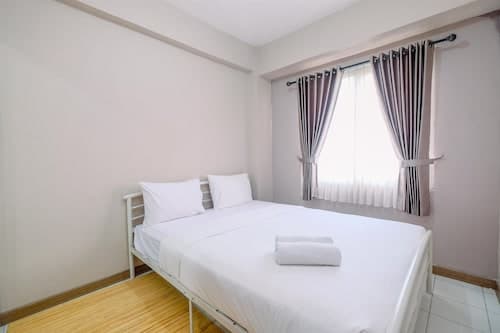 Homey and Cozy Living 2BR Podomoro Golf View Apartment