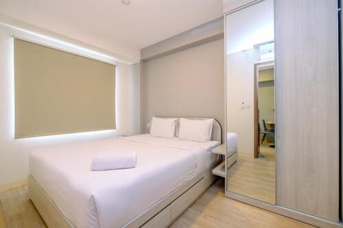 Minimalist and Warm 2BR at 29th Floor Podomoro Golf View Apartment