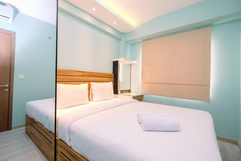 Best Homey and Comfort 2BR at Podomoro Golf View Apartment