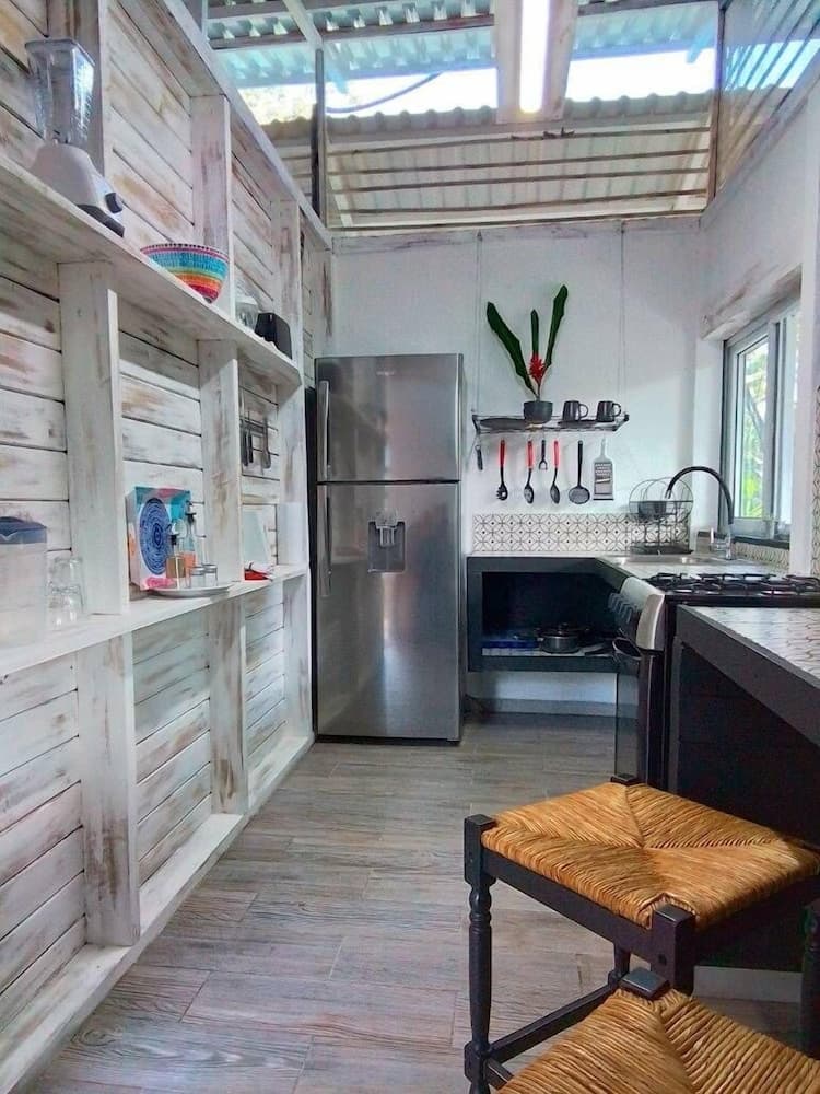Casitas en la Jungla - Luz Tropical