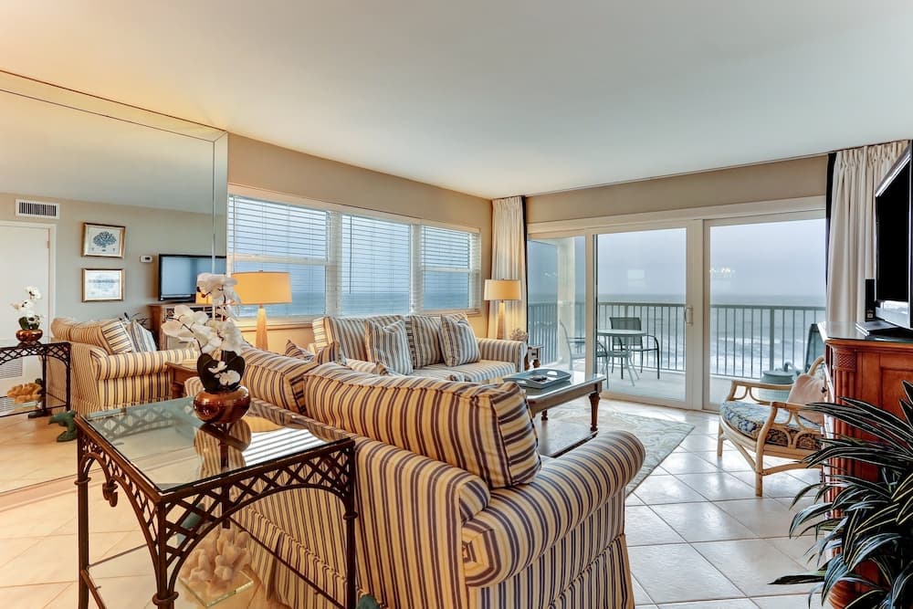 North End Corner Unit with View of the Ocean and Miles of Sandy Beach by RedAwning