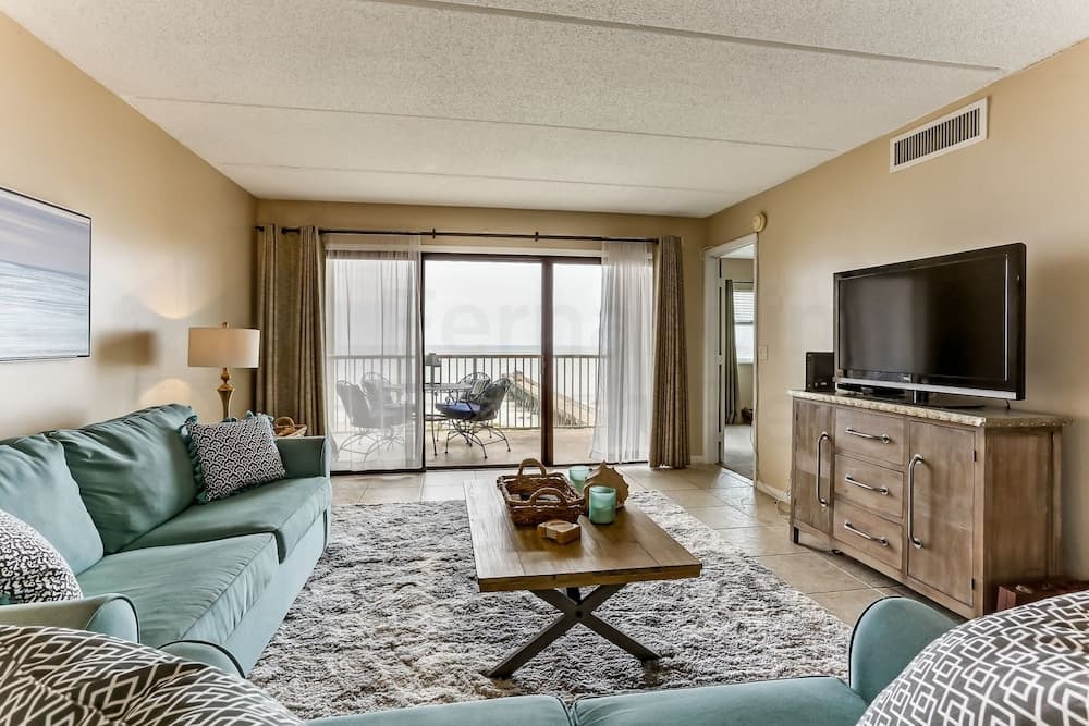 Comfy Upper Unit Condo to Enjoy the Beach or the Fishing by RedAwning