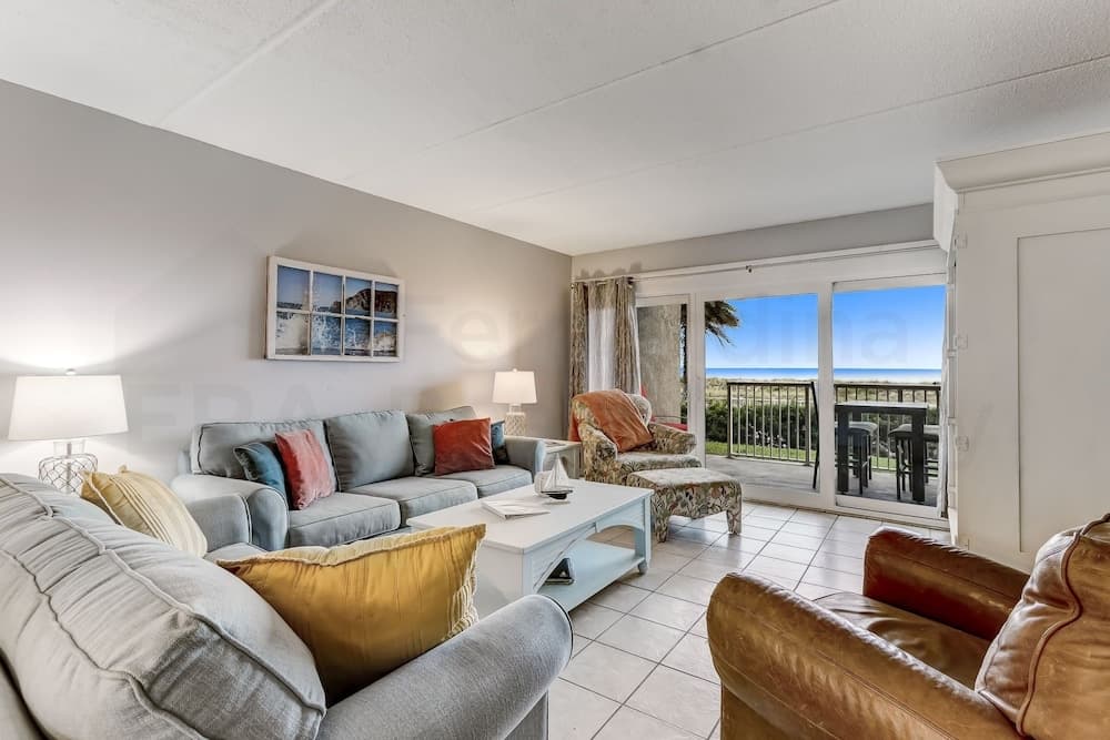 Spacious Oceanfront Condo, Easy Access to Private Fishing Pier by RedAwning
