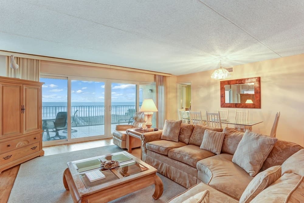 Oceanfront Condo with Spacious Patio and Private Walkway to the Beach by RedAwning