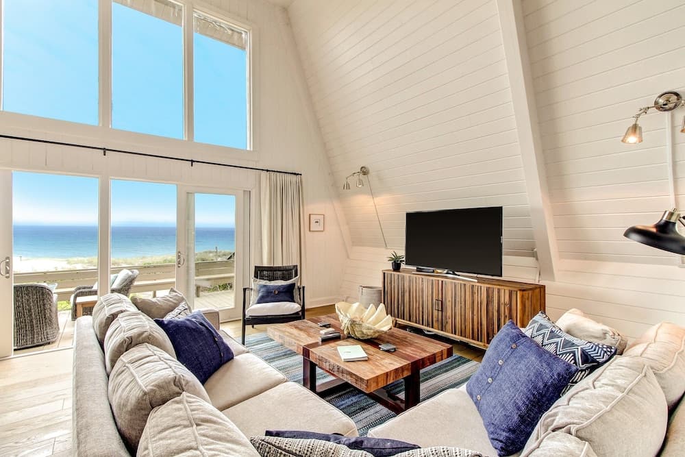 Roomy Chalet-Style Beachfront Condo with Private Beach Access by RedAwning