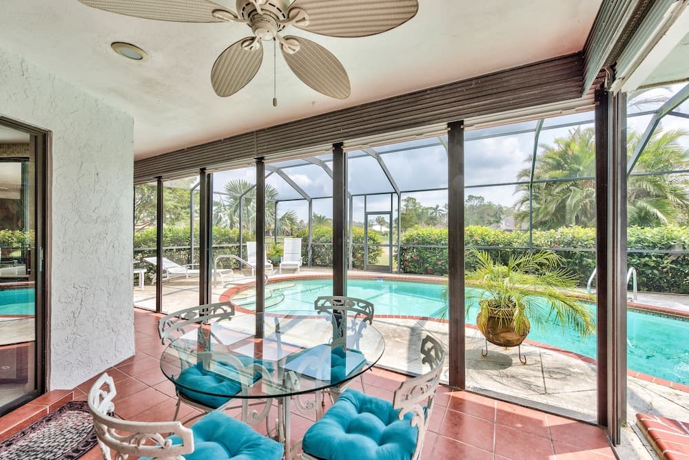 Rovigo Vacation Rental: Spacious Retreat with Panoramic Lake Views in Kings Lake. 4-BR, 4-Bathroom Home with Private Pool, just 3.4 Miles from the Vibrant Fifth Avenue South and Naples Attractions