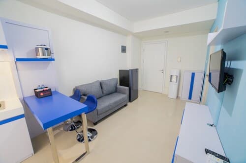 Cozy Apartment at Parahyangan Residence with Direct Access to Swimming Pool