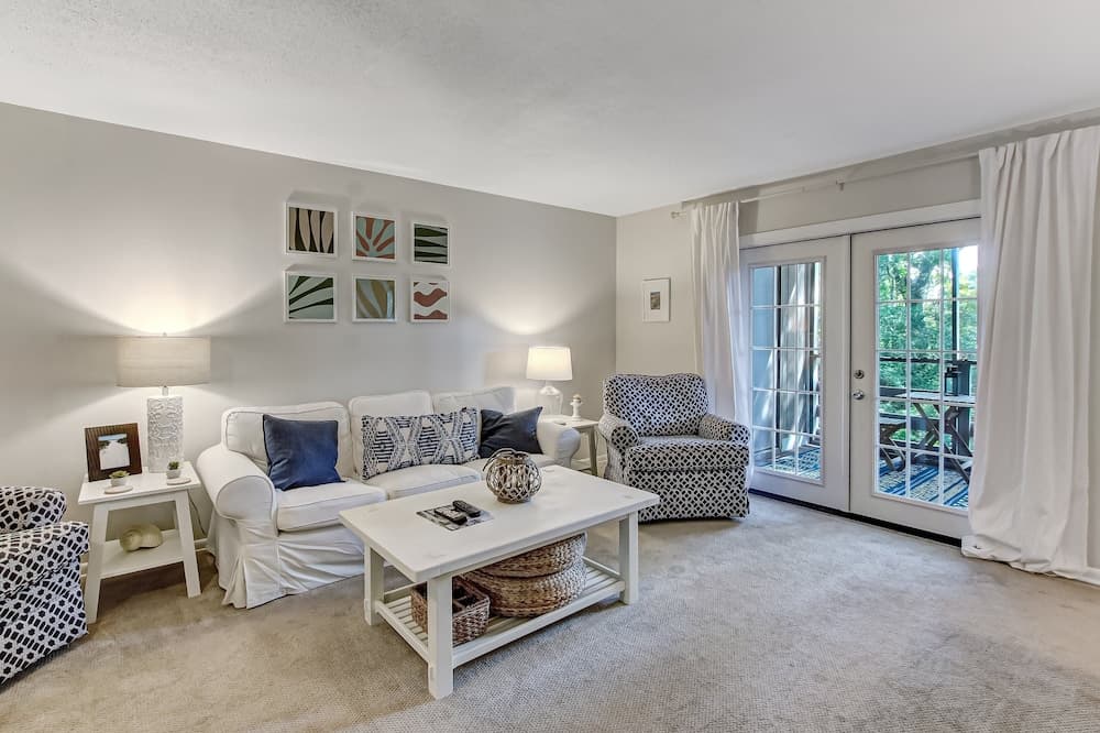 Secluded Condo with Peaceful Wooded Views and Easy Access to the Beach by RedAwning