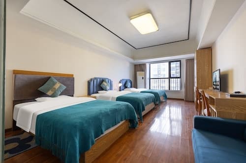 Home Inn Huayi Apartment
