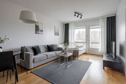 Modern 1BR Apt with Sauna, Balcony & Free Parking
