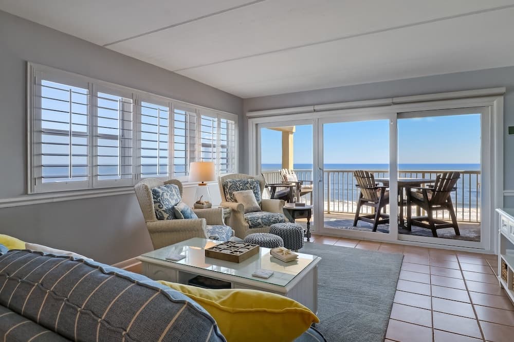 Beach Condo Miles-long Views Sand and Sea, Access to Private Fishing Pier by RedAwning