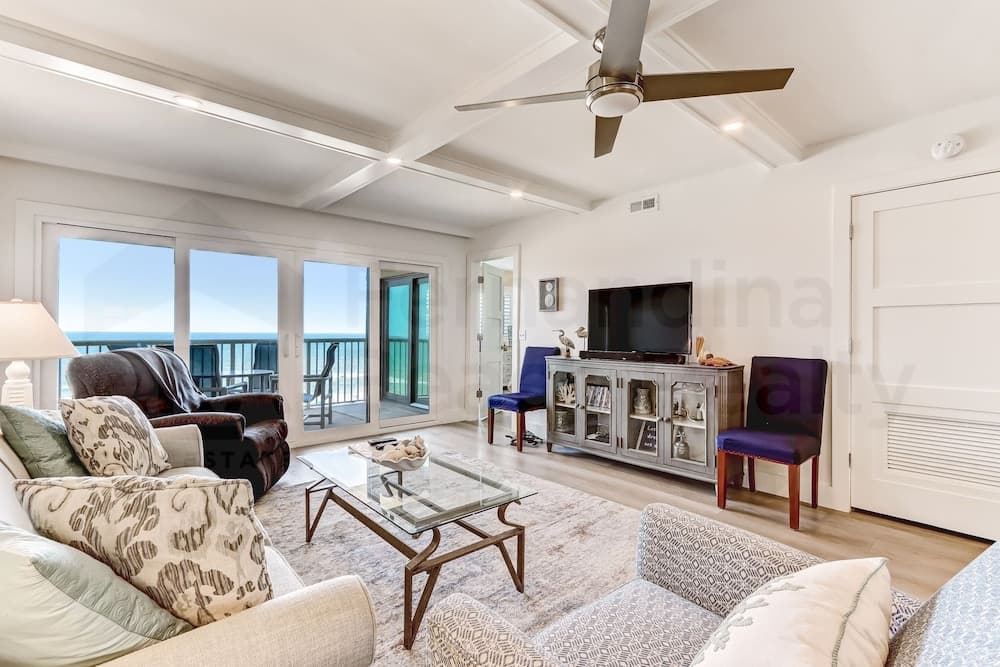High End Coastal Feel Condo with Access to Beachside Pool by RedAwning