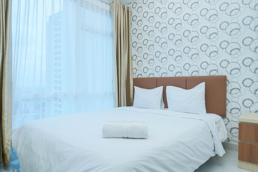 Strategic Location 1BR Apartment @ Puri Mansion near Puri By Travelio