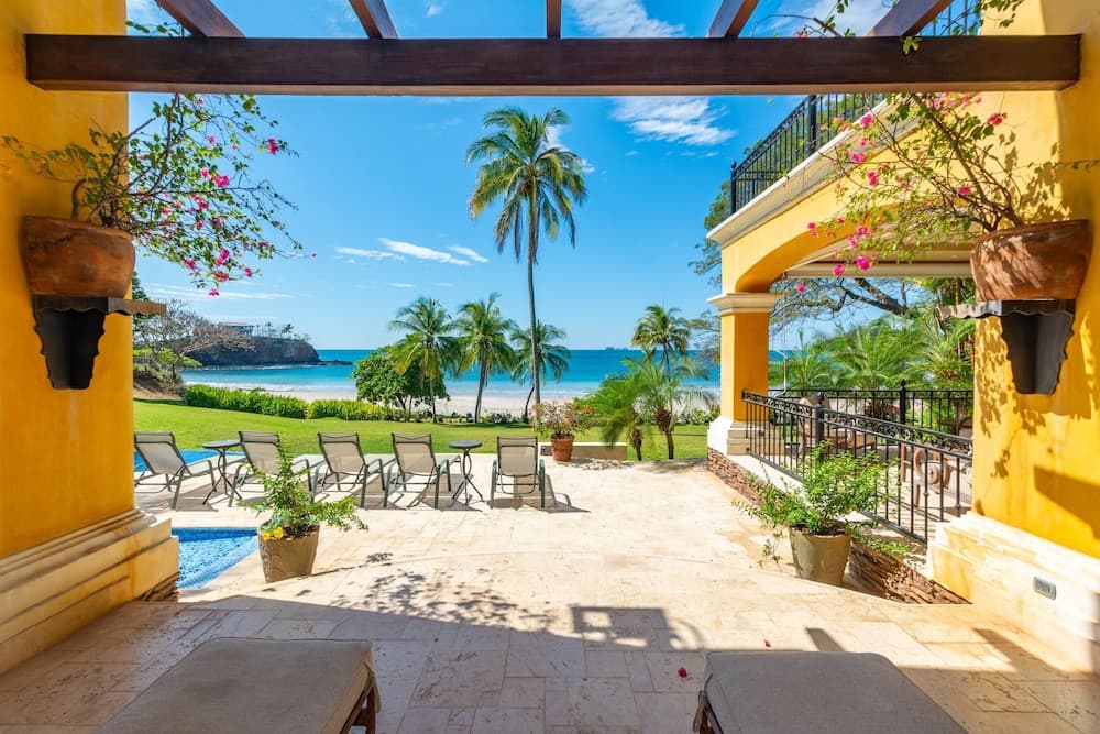 Mediterranean-style Flamingo Mansion Offers the Ultimate in Beachfront Luxury