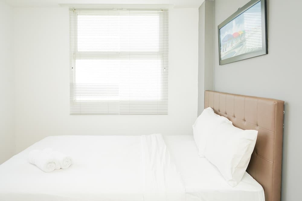 Cozy 2BR Apartment at Tuscany Residences With Garden View