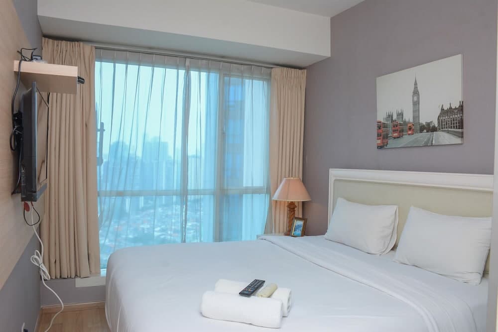 Homey And Cozy Stay 2Br At Casa Grande Apartment