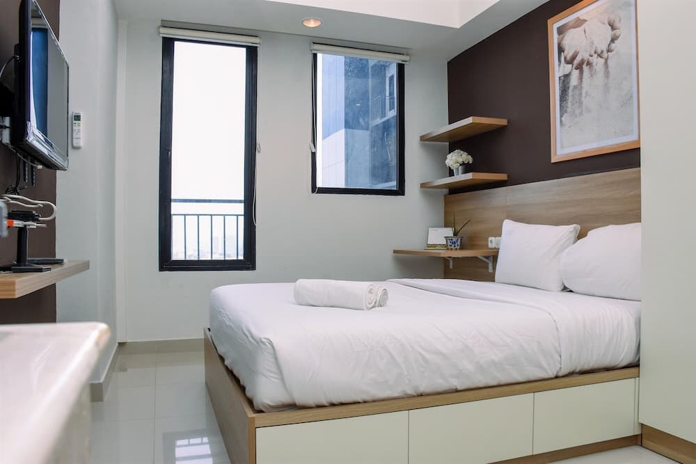 Comfy Studio Room at Evenciio Margonda Apartment