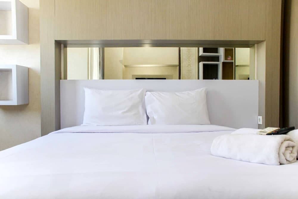 Homey and Tidy Studio at The Oasis Apartment