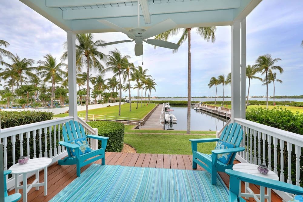 Waterfront Luxury Villa With Sunset Views And Boat Slip 3 Bedroom Townhouse by RedAwning