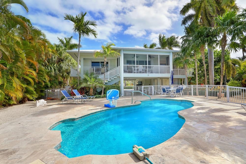 Waterfront Luxury Home With Pool And Boat Dock 3 Bedroom Home by RedAwning