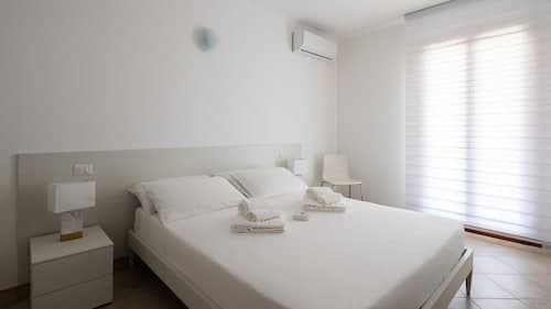 Welcomely - Xenia - Attico Mediterraneo