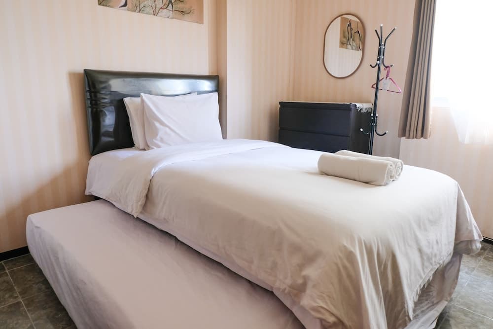 Homey And Cozy Studio Room At Suites @Metro Apartment