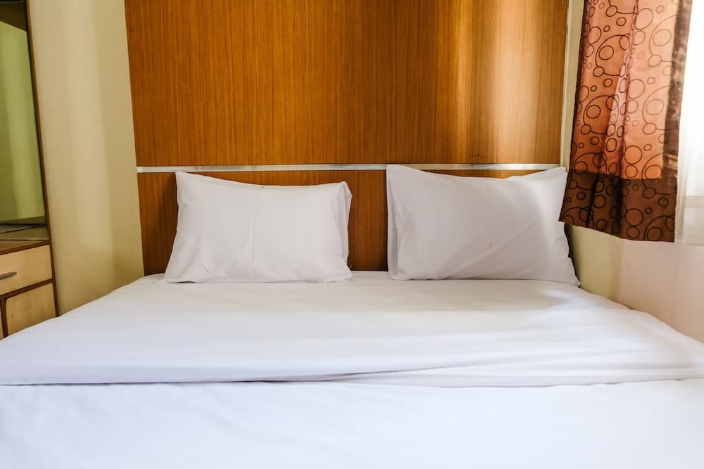 Homey 2Br At Suites @Metro Apartment