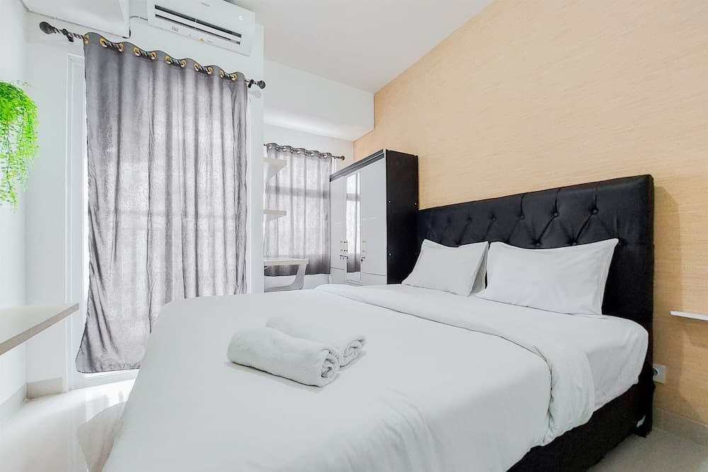 Minimalist And Homey Studio Serpong Garden Apartment