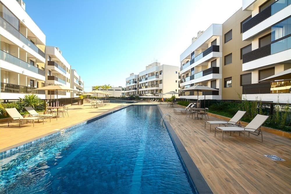 Apto 100m da Praia Com Piscina Aquecida e Lazer - Cachoeira do Bom Jesus - Floripa