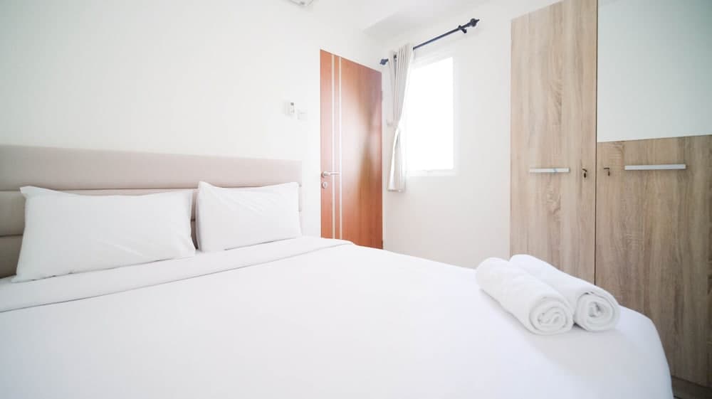 Cozy Living And Tidy 2Br At Puncak Dharmahusada Apartment