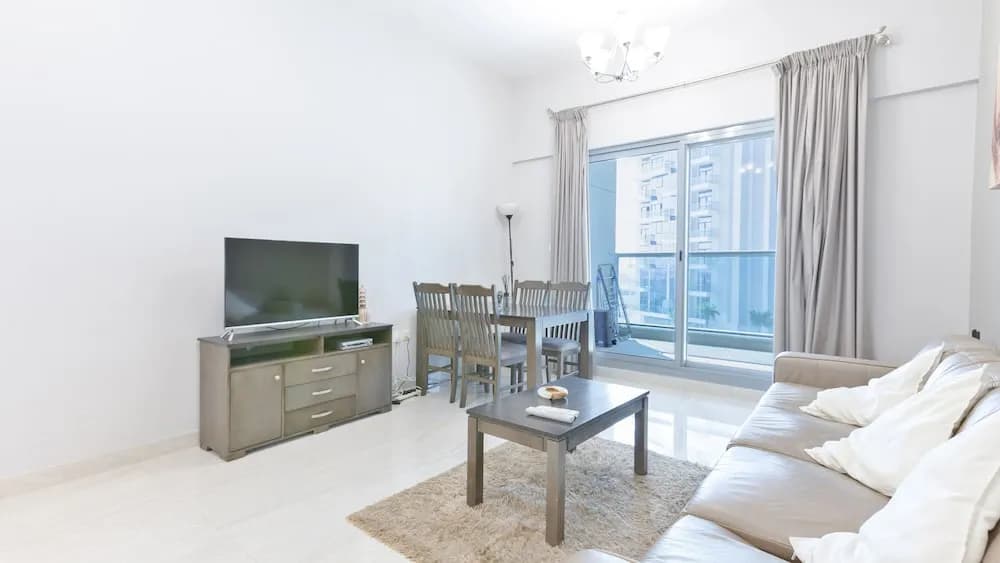 Luxury StayCation - Vibrant 1BR Apartment With Pool and Huge Balcony