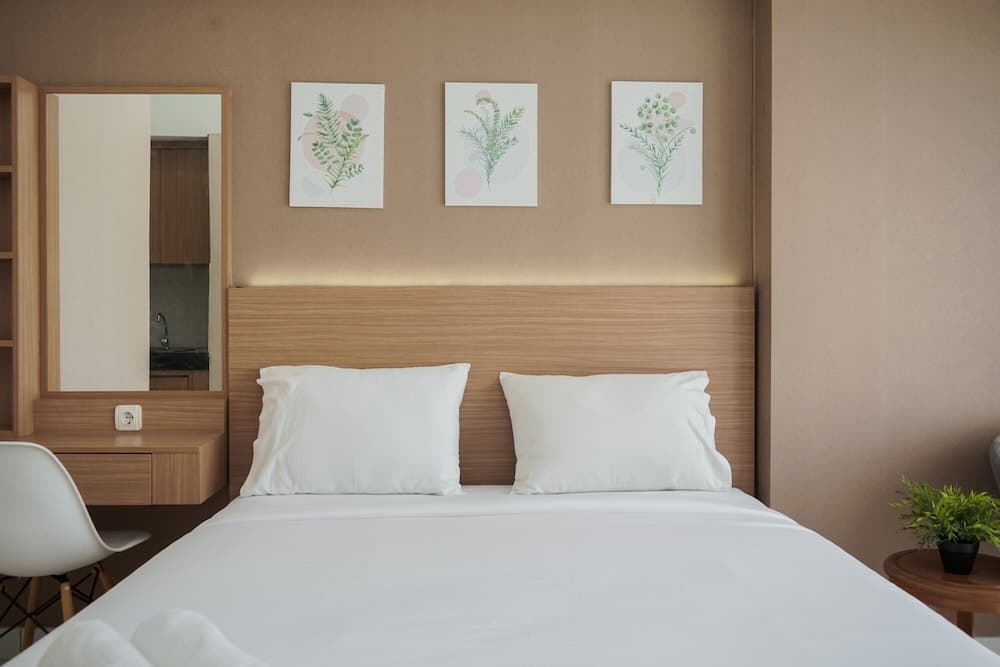 Comfort And Cozy Studio At Casa De Parco Apartment