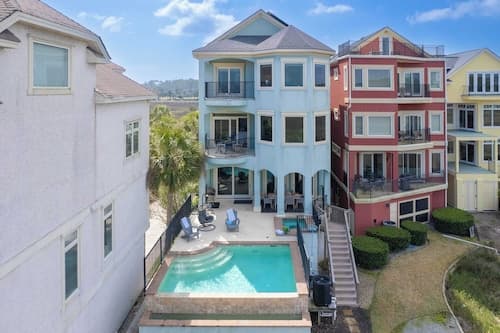Steps to Beach, Infinity Pool + Hot Tub, Game Room Coastal Marsh by Avantstay