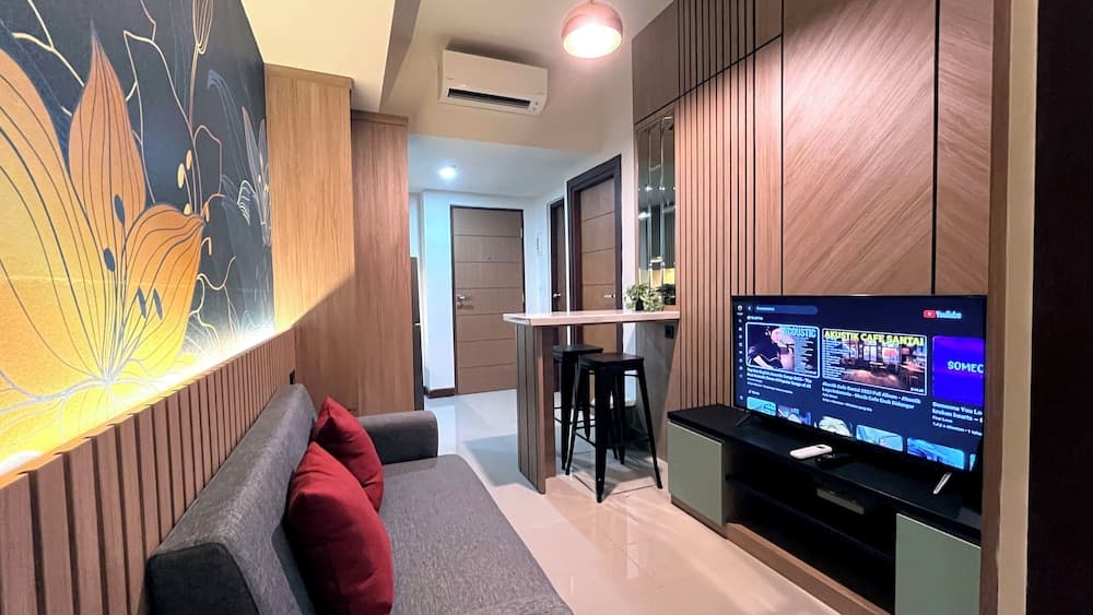 Warm And Homey 2Br At Vida View Makassar Apartment