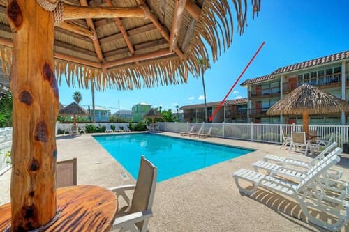 Beach Boardwalk Access Pool + Remodeled Interior Tropical Haven by Avantstay