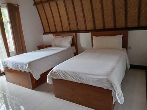 Ratu Cottage by OurStory Travels