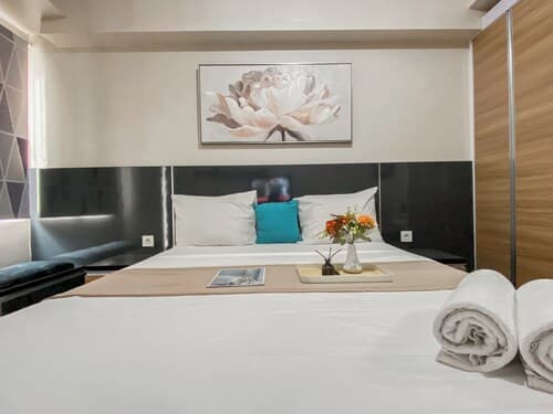 Warm and Homey Studio at Podomoro Golf View Apartment