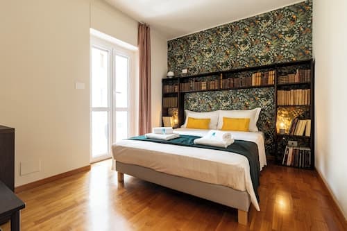 Turin Bed & Books by Wonderful Italy